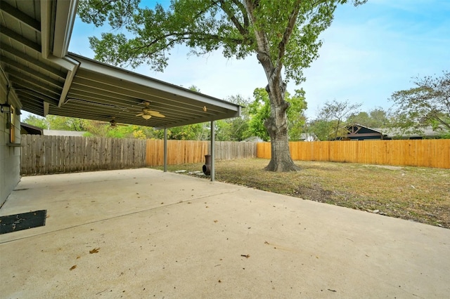 view of patio featuring ceiling fan