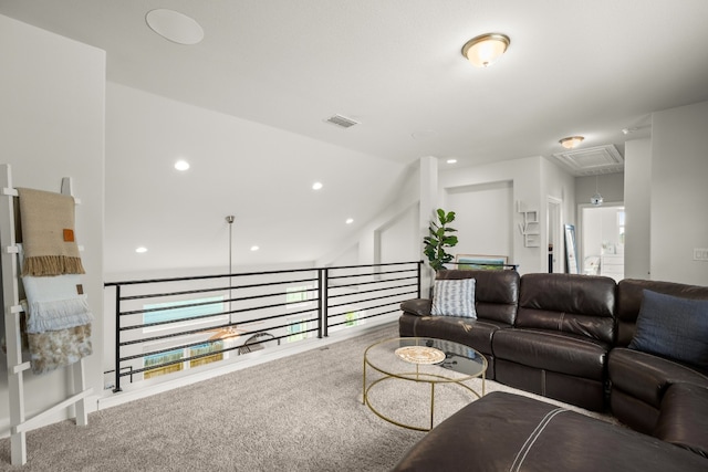 living area featuring attic access, visible vents, carpet, vaulted ceiling, and recessed lighting