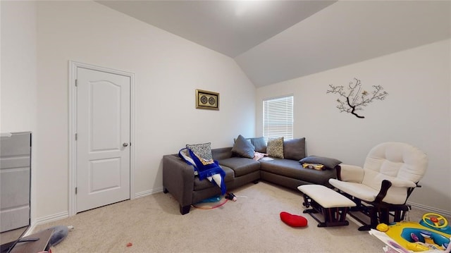 carpeted living room featuring lofted ceiling