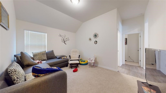 living room with light carpet and lofted ceiling