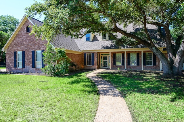 view of front of home with a front lawn