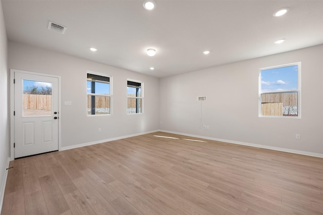 empty room featuring light hardwood / wood-style flooring