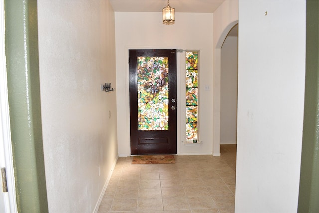 entrance foyer featuring light tile patterned flooring