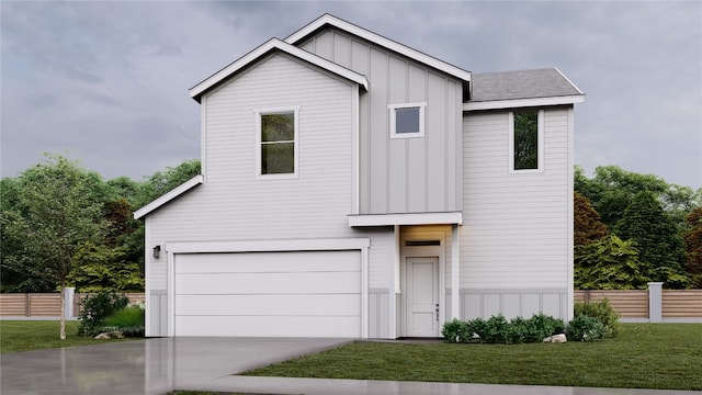 view of front of property with a garage and a front yard