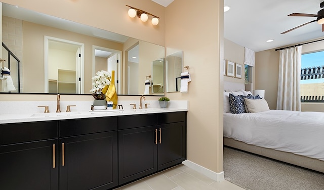 bathroom featuring vanity, tile patterned floors, and ceiling fan