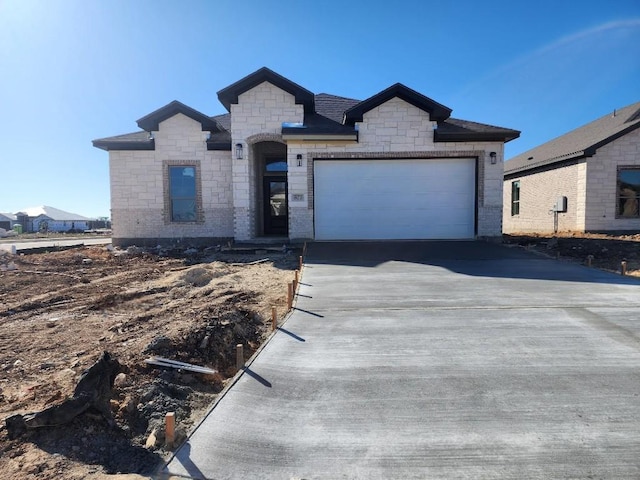 view of front of home featuring a garage