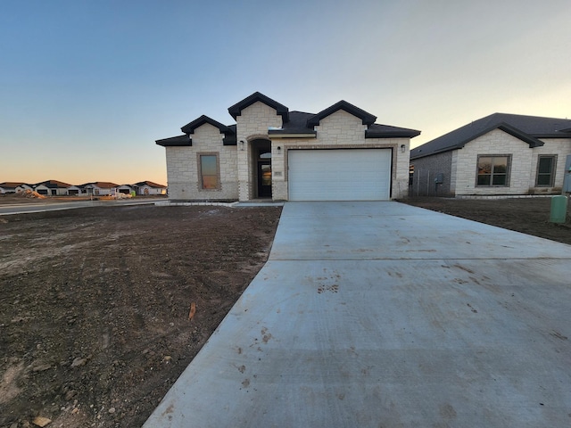 view of front of home featuring a garage