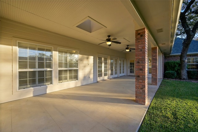 view of patio featuring ceiling fan and french doors