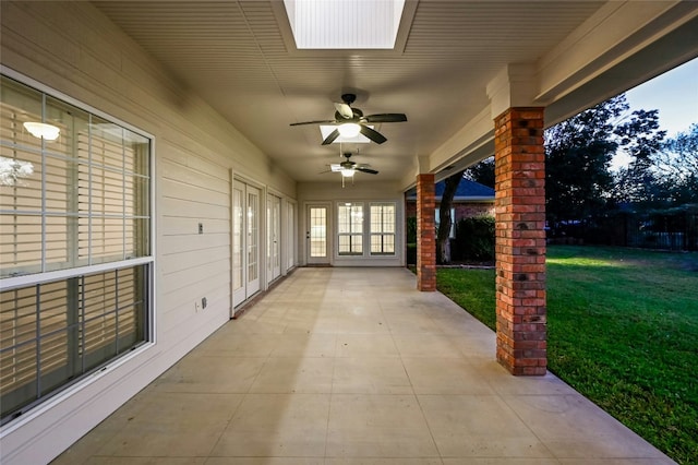 view of patio / terrace featuring french doors and ceiling fan