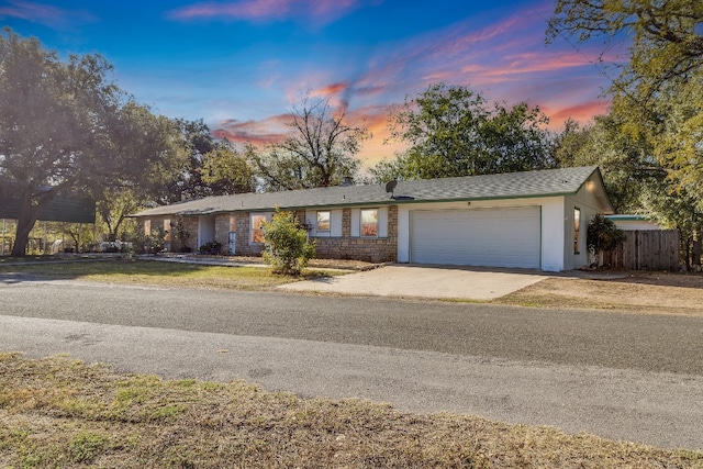 ranch-style home with a garage