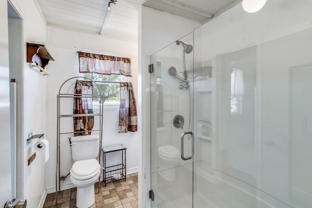 bathroom with a shower with door, wood ceiling, and toilet