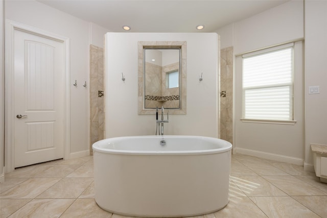 bathroom featuring shower with separate bathtub and tile patterned flooring