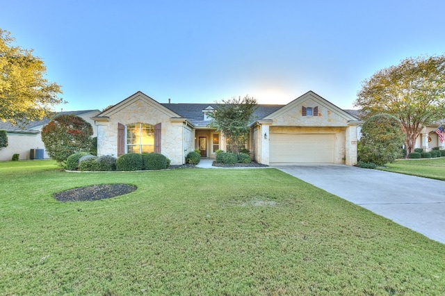 single story home with a garage, central air condition unit, and a front yard