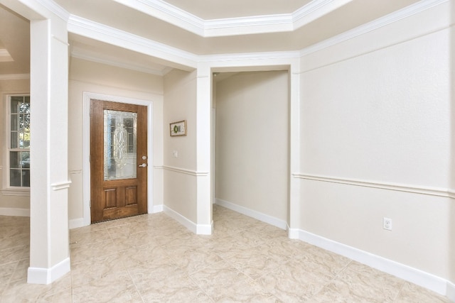 entryway featuring crown molding