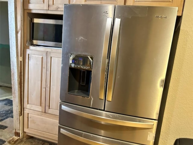 kitchen featuring appliances with stainless steel finishes and light brown cabinets