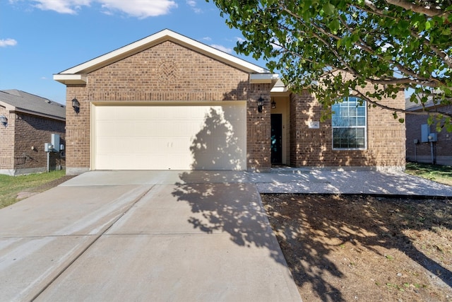 ranch-style house featuring a garage