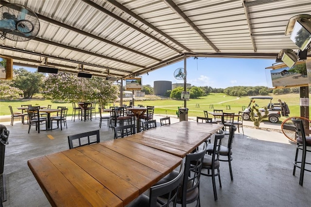 view of patio featuring ceiling fan