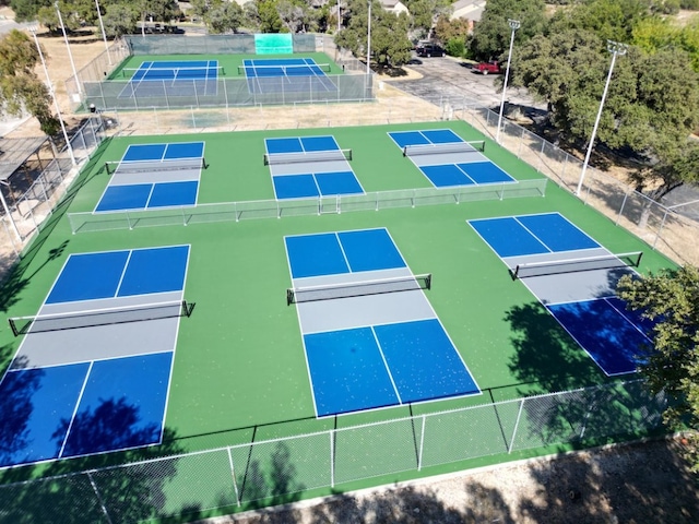 view of sport court featuring basketball hoop