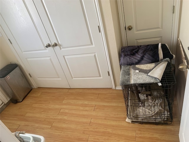 hall with light wood-type flooring