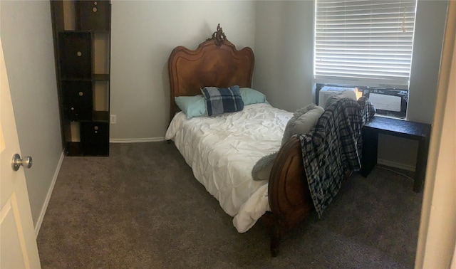 bedroom featuring dark carpet