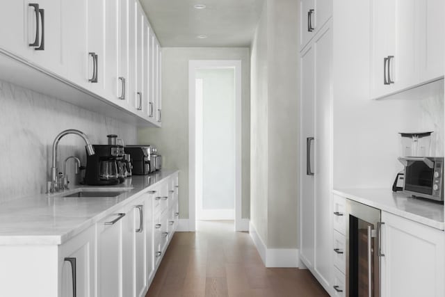 4101 Mcbrine Pl, Austin, TX 78746 - bar with beverage cooler, dark wood-style flooring, and recessed lighting
