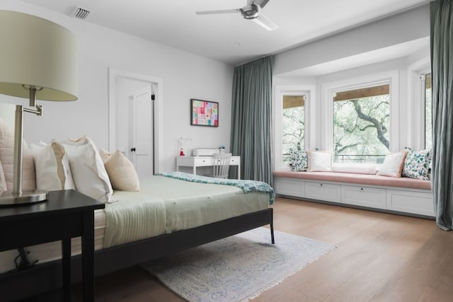 bedroom featuring ceiling fan and light hardwood / wood-style flooring