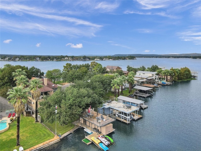 birds eye view of property featuring a water view