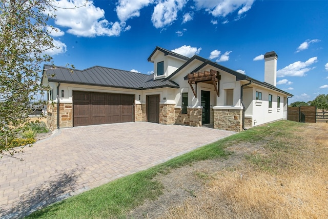 view of front of home featuring a garage