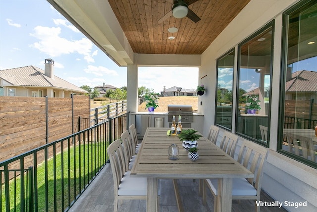 balcony featuring ceiling fan and grilling area