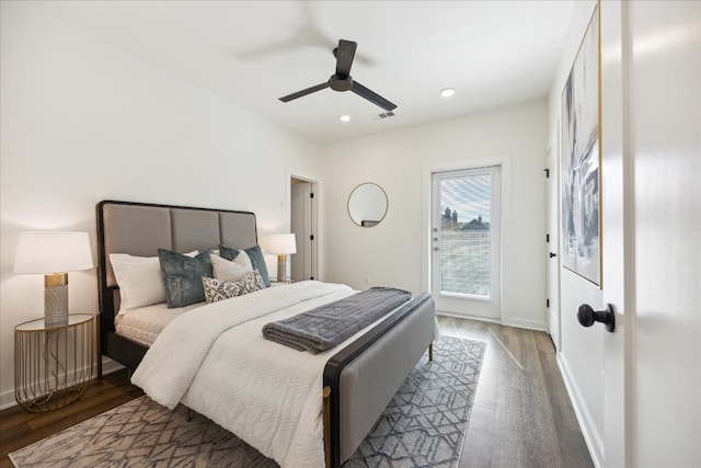 bedroom featuring ceiling fan and dark hardwood / wood-style floors