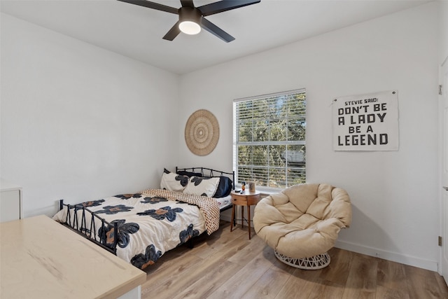 bedroom featuring ceiling fan and wood-type flooring