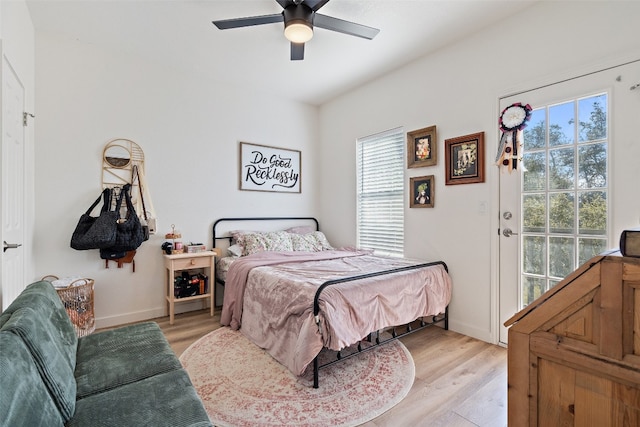 bedroom with ceiling fan and light wood-type flooring