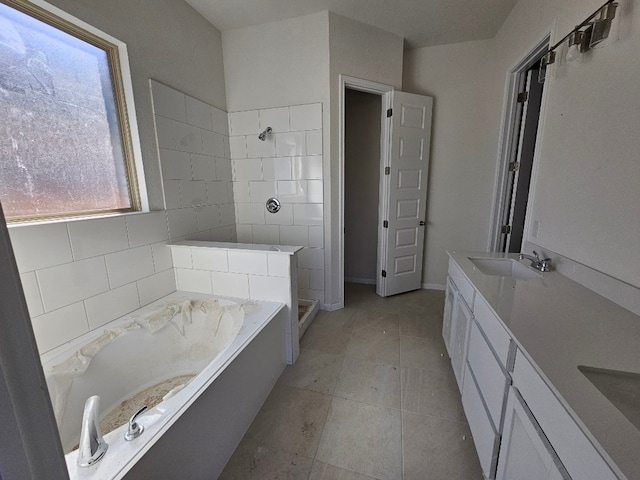 bathroom with separate shower and tub, vanity, and tile walls