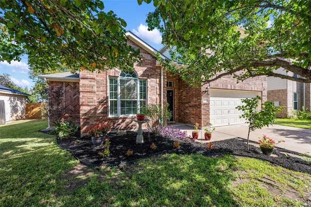 obstructed view of property with a garage and a front lawn