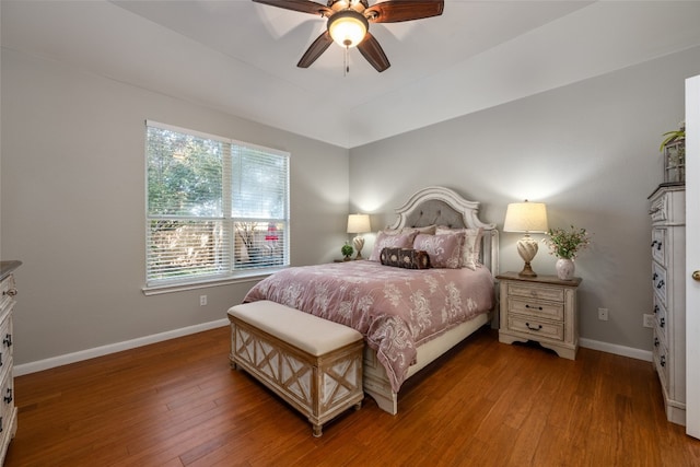 bedroom featuring hardwood / wood-style flooring and ceiling fan