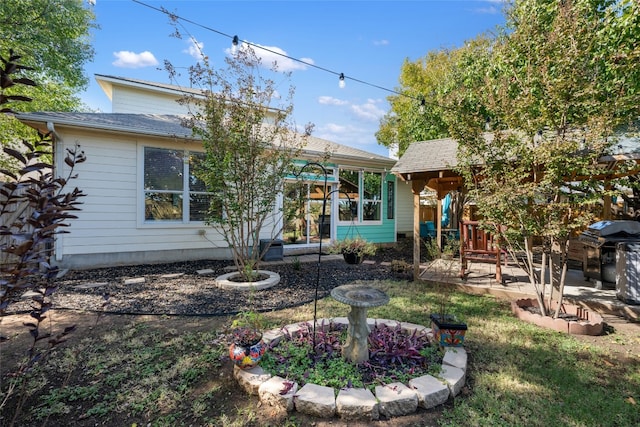 view of front of home with a patio