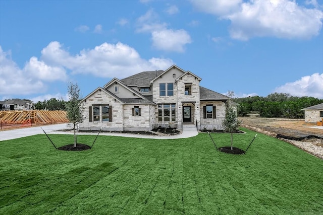 view of front of house with a front lawn