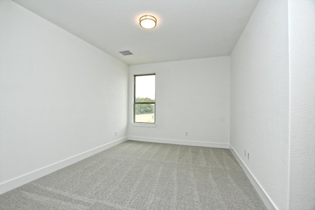 spare room featuring carpet flooring