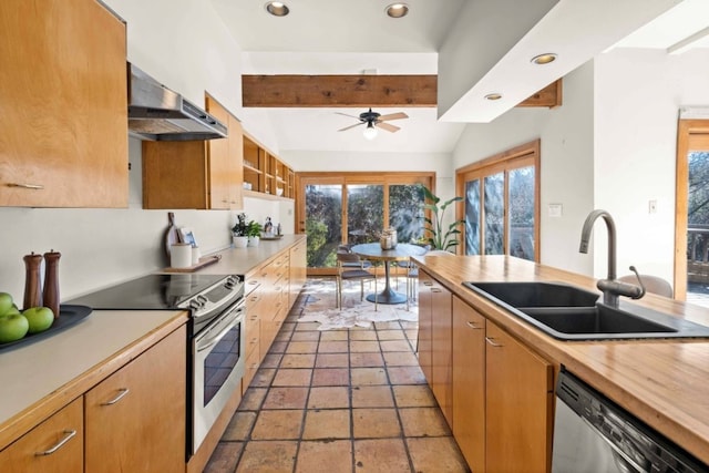 kitchen featuring stainless steel appliances, extractor fan, ceiling fan, sink, and vaulted ceiling with beams