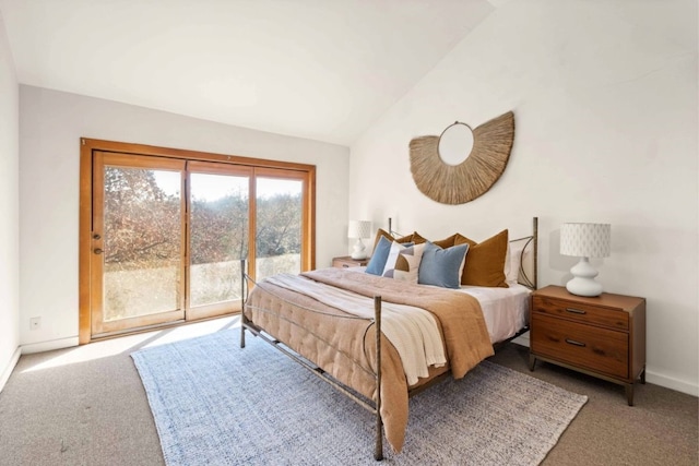 bedroom with access to exterior, light carpet, and vaulted ceiling