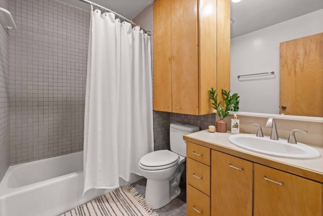 full bathroom with decorative backsplash, vanity, shower / tub combo with curtain, tile patterned flooring, and toilet