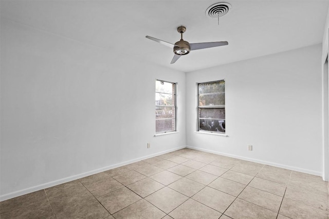 8507 Contour Dr, Austin, TX 78757 - unfurnished room with a ceiling fan and light tile patterned floors