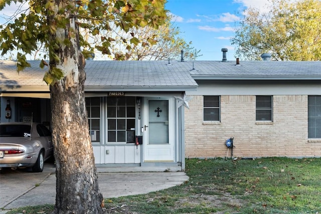 8507 Contour Dr, Austin, TX 78757 - view of front facade featuring board and batten siding, brick siding, and a shingled roof