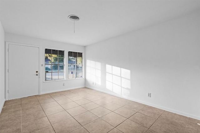 8507 Contour Dr, Austin, TX 78757 - empty room featuring light tile patterned flooring and baseboards