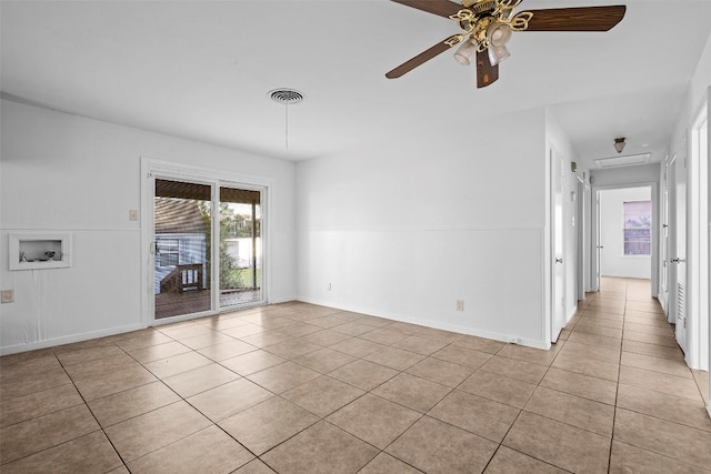 8507 Contour Dr, Austin, TX 78757 - unfurnished room with light tile patterned floors and plenty of natural light