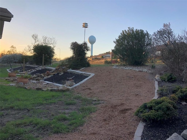3704 Bunyan Cir, Lago Vista, TX 78645 - view of yard at dusk