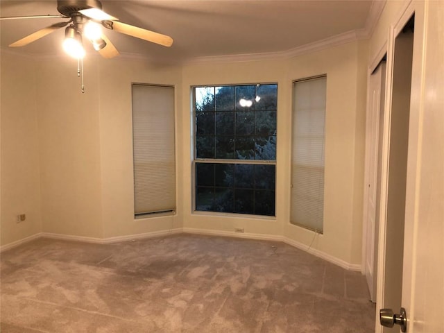 3704 Bunyan Cir, Lago Vista, TX 78645 - unfurnished room featuring carpet flooring, crown molding, and a ceiling fan