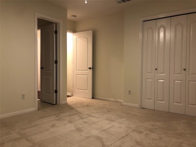 3704 Bunyan Cir, Lago Vista, TX 78645 - unfurnished bedroom with light carpet and a closet