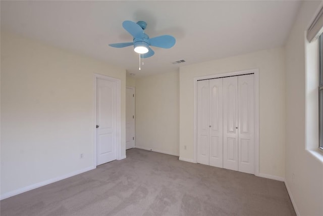 3704 Bunyan Cir, Lago Vista, TX 78645 - unfurnished bedroom with carpet flooring, a closet, and ceiling fan