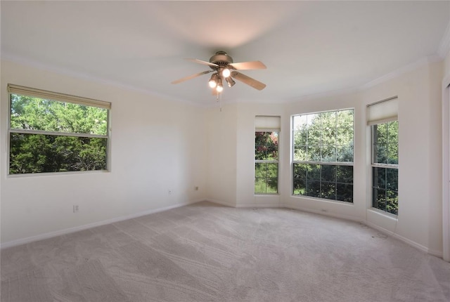 3704 Bunyan Cir, Lago Vista, TX 78645 - empty room with ceiling fan, light carpet, and ornamental molding
